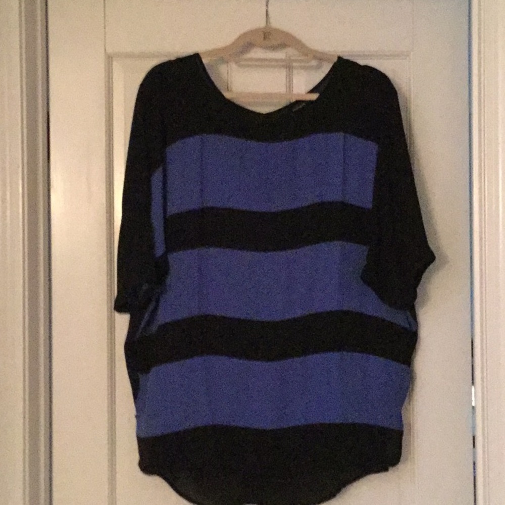 Flowing blue and black top.